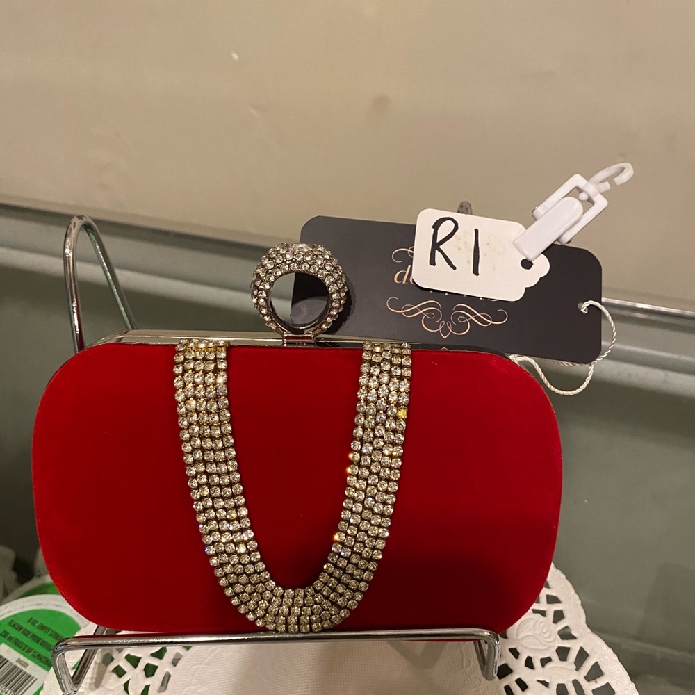 Red Evening clutch, brand new, never used.
